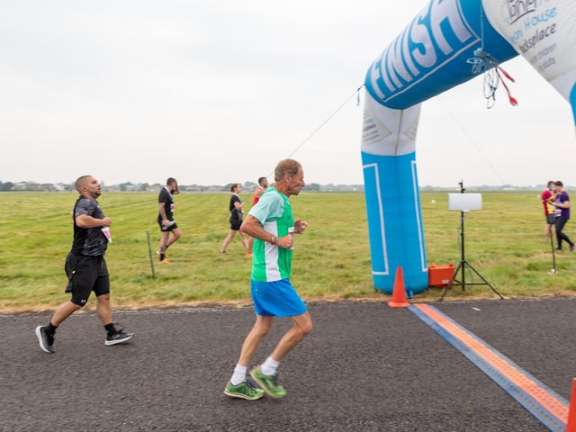 Approaching the finish line of the Run the Runway event at Solent Airport.
Picture: Mike Cooter