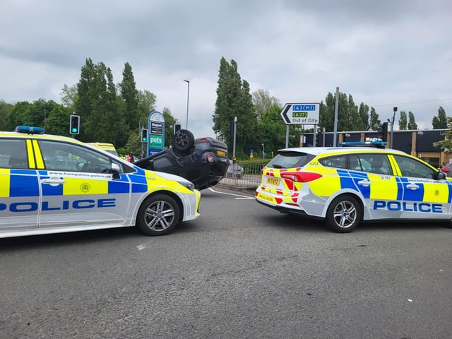 Car flips in Burrfields Road crash