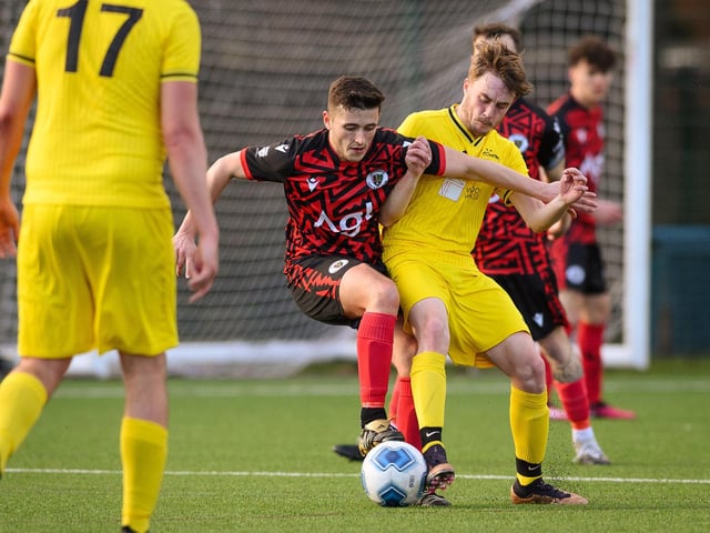 Action from Harvest's 4-1 win at home to Locks Heath (red and black kit) in the Hampshire Premier League. Picture: Keith Woodland (180321-1520)