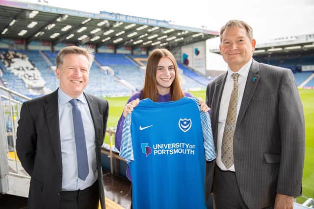Portsmouth FC CEO Andrew Cullen, Nadine Smith and University of Portsmouth vice-chancellor Graham Galbraith celebrate the award of the Portsmouth FC scholarship.
