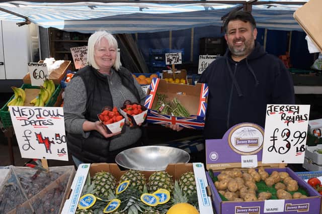 Pictured is: Sandy and Perry who have run Leon's fruit and veg market stall for the 25 years.
Picture: Keith Woodland (240421-2)