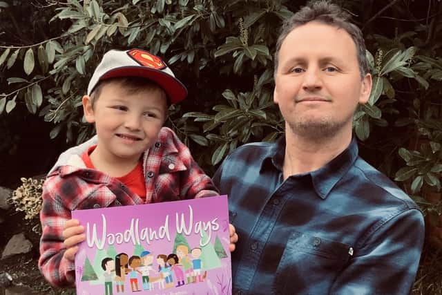 Paul Parsons, illustrator, with his son Eben