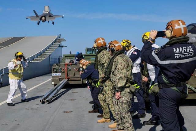 Pictured: Admiral Radakin, Admiral Vandier, and Admiral Gilday witness F-35B aircraft take off from HMS Queen Elizabeth.