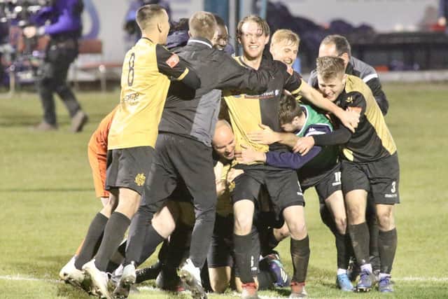 Eighth-tier Marine FC are ecstatic after beating the Hawks. Picture: Kieron Louloudis