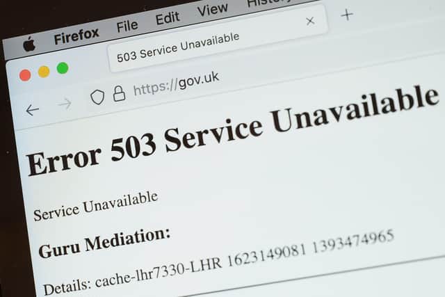 In this Photo illustration, a screen displays a holding page of the Gov.UK Government website portal on June 08, 2021 in London, England. (Photo by Leon Neal/Getty Images)