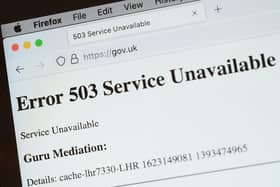 In this Photo illustration, a screen displays a holding page of the Gov.UK Government website portal on June 08, 2021 in London, England. (Photo by Leon Neal/Getty Images)