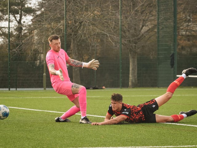 Action from Harvest's 4-1 win at home to Locks Heath (red and black kit) in the Hampshire Premier League. Picture: Keith Woodland (180321-601)