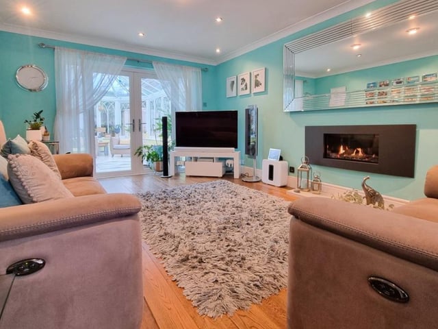 The listing says: "A modern, detached residence which is situated in an elevated location within an exclusive development of approximately 140 similar style and size homes."