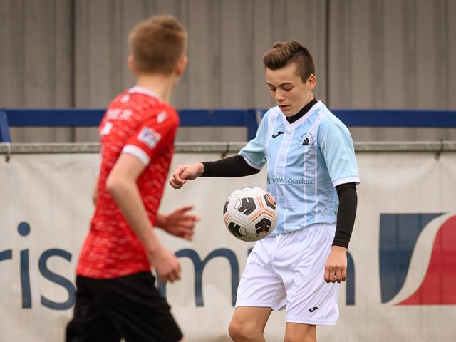 Action from the Portsmouth Youth League Geldard Invitation Cup final between Jubilee 77 U13s and Castle United U13s (light blue and white kit). Picture: Keith Woodland (190321-510)