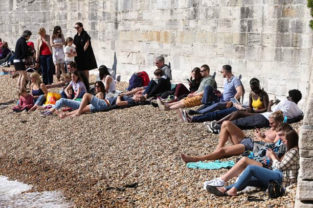 Sunbathers at the Hotwalls, Old Portsmouth
Picture: Chris Moorhouse