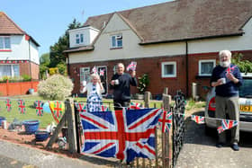 From left, Marilyn Barnes (72) and her husband Raymond (74) with their neighbour Mick Toone (85).
Picture: Sarah Standing (070520-8283)