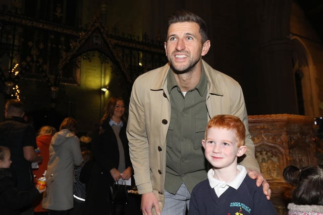 Portsmouth FC manager John Mousinho and Benjaminn Mountford, 6. The News Carol Service, St Mary's Church, Fratton, Portsmouth
Picture: Chris Moorhouse (jpns 081223-79)