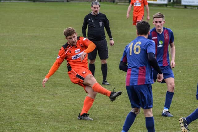 Action from AFC Portchester (orange) v US Portsmouth. Picture: Daniel Haswell.