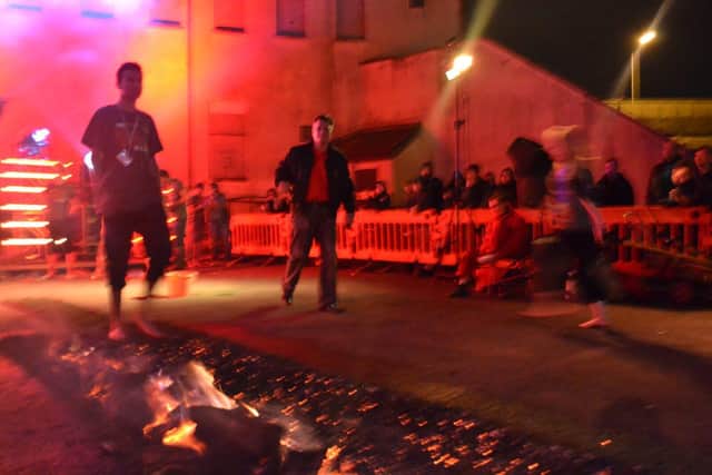 Walk over hot coals for charity this summer