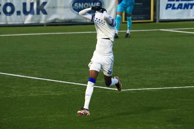 Mo Faal celebrates after scoring his second goal - picking up a booking for removing his shirt. Picture by Dave Haines.