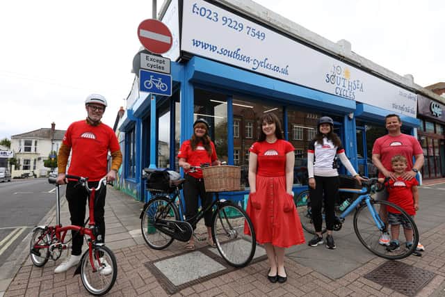 From left, Cllr George Fielding, activist Paula Ann Savage, Emma Strong from World Bicycle Relief, Cllr Charlotte Gerada and Southsea Cycles shop owner Kevin Watkins with his son Max, seven
Picture: Chris Moorhouse (jpns 060621-)
