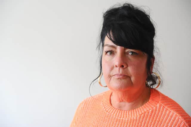 Grandmother-of-six Pauline Hopkins, 56, pictured at home in Baffins, Portsmouth, has spoken about an attempted rape she alleges against a man who gave her a lift home after a night out. Picture: Sarah Standing (130220-7474)