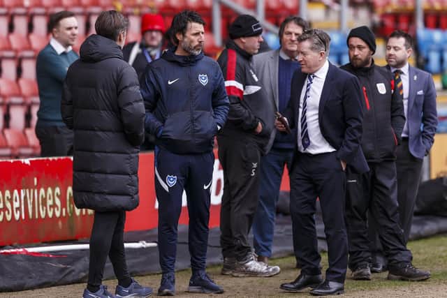 Danny Cowley, chief executive Andy Cullen and assistant manager Nicky Cowley inspect the Gresty Road pitch following the calling off of today's match. Picture: Daniel Chesterton/PinPep