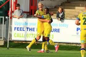 Danny Wright, left, celebrates with Gianni Crichlow after opening the scoring. Picture by Dave Haines
