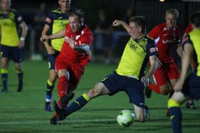 Horndean's Connor Duffin fires in  a shot at goal against Moneyfields. Picture Stuart Martin