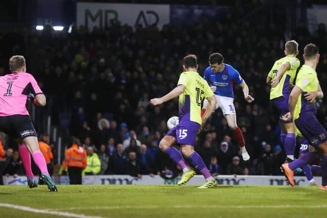 Portsmouth's John Marquis scores during the Blues' EFL Trophy semi-final win against Exeter in February 2020.
