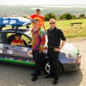 The team with the car and their sponsors (from left) Jason Munro, Andy Painting, David England, Mark Powell and Tony Wells.