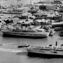 Three carriers in Portsmouth at the same time. Seen in Portsmouth Harbour in February 1989 are HM Ships Invincible, Ark Royal  and Illustrious. Picture: Terry Pearson collection