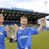 Flashback to April 2013 - Captain Harvey Tanner, left, and Tommy Leigh after Priory School won the Hampshire Schools U13 Cup final against Salesian College at Fratton Park. 
Picture: Ian Hargreaves