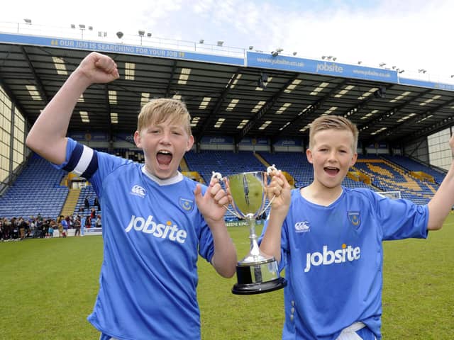 Flashback to April 2013 - Captain Harvey Tanner, left, and Tommy Leigh after Priory School won the Hampshire Schools U13 Cup final against Salesian College at Fratton Park. 
Picture: Ian Hargreaves