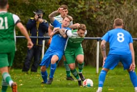 Charlie Bell (green) netted twice as Moneyfields won 5-0 at Paulsgrove in the Russell Cotes Cup.
Picture: Keith Woodland