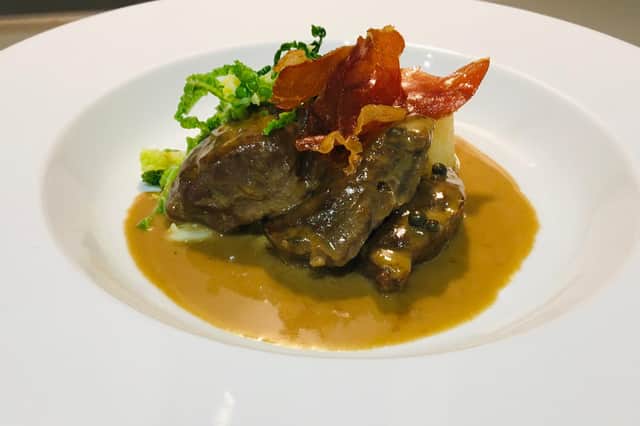 Pork cheek in cider and green peppercorn sauce by Lawrence Murphy
