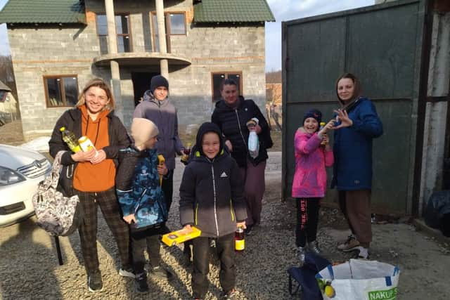 Families sharing a shelter in Ukraine.