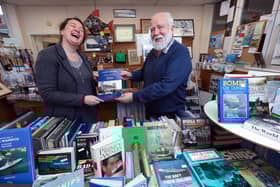 Manager Ashley Bradshaw and Mike Critchley. Gosport Tourist  Information Centre has been given a six month lease of life at Gosport Bus Station
Picture: Chris Moorhouse (jpns 301223-44)