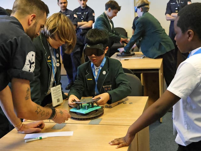 Year 7 pupils from St Edmunds Catholic School learn how to fix machines