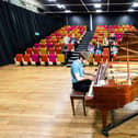 A student at HSDC Havant playing the piano.