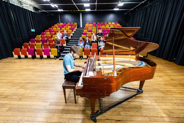 A student at HSDC Havant playing the piano.