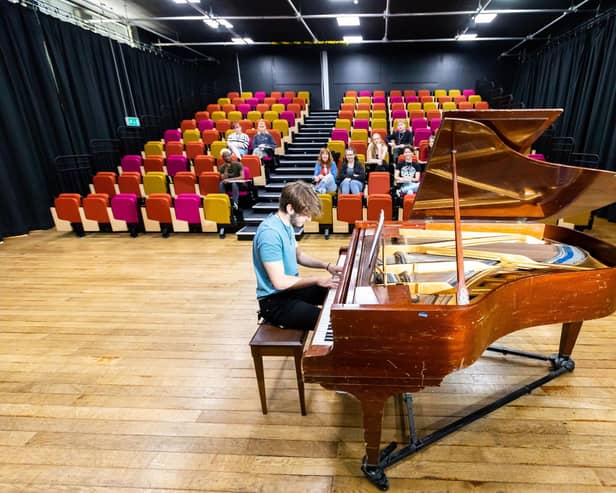 A student at HSDC Havant playing the piano.