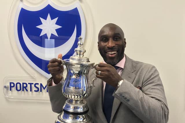 Sol Campbell pictured with a replica FA Cup during a Fratton Park visit in 2017