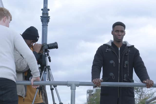 Shooting The Mire in Portsmouth. Directed by Adam Nelson (back to camera), starring Joseph Adelakun (right)