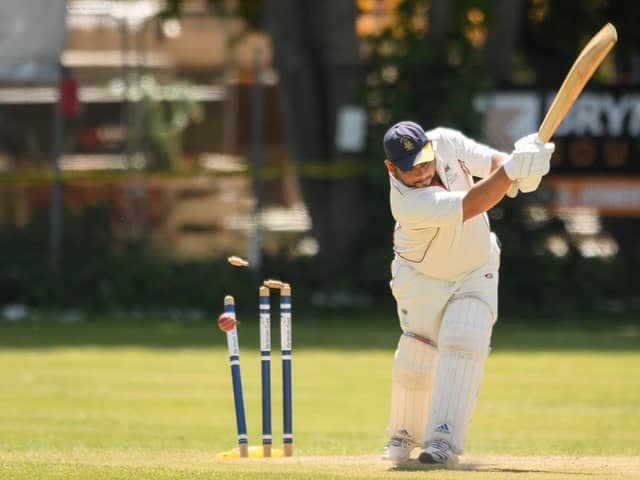 US Portsmouth opener Sesh Nadathur is bowled by Portsmouth & Southsea's Mo Ali. Picture: Keith Woodland