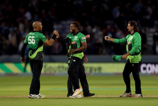 Southern Brave's Chris Jordan, middle, celebrates with Tymal Mills after their side's dramatic win  at Lord's last night. Picture: Steven Paston/PA Wire.