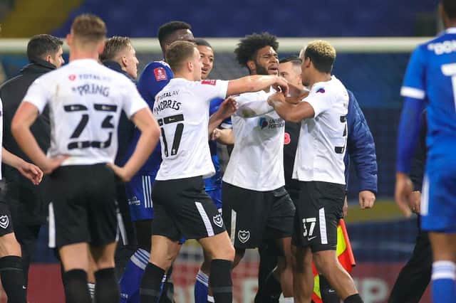 Tempers flare a little at full time during the The FA Cup match between Ipswich Town and Portsmouth at Portman Road, Ipswich, England on 7 November 2020.