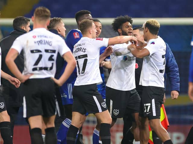 Tempers flare a little at full time during the The FA Cup match between Ipswich Town and Portsmouth at Portman Road, Ipswich, England on 7 November 2020.