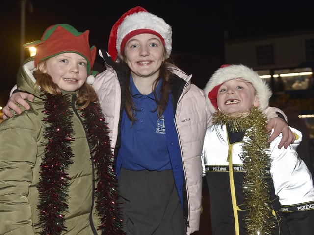 Emsworth Christmas lights were switched on in St Peter's Square on Friday, December 1, 2023.
Pictured is: (l-r) Martha (10), Bethany (11) and Joshua (7).
Picture: Sarah Standing (011223-2921)