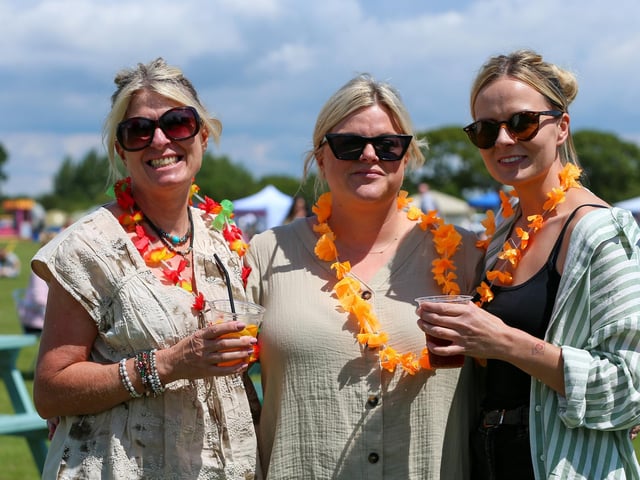Sam Hayward, left, and her daughters, Jazz and Amber, right. Wave Festival, Tournerbury Golf Centre, Hayling Island. Picture: Chris Moorhouse (130724-21)
