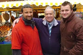 2007. Market traders now placed in Commercial Road Portsmouth. Three of the four generations ¬ (Centre) George Warren (73), with (left) his son Michael (46) and (right) his grandson James (25. Picture: Mallcolm Wells (070151-120)