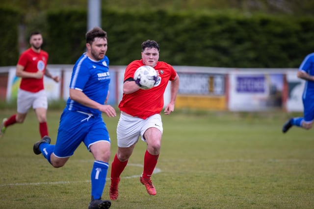 Action from Gosport Town's 4-0 victory over Lee Rangers (blue kit) in the Portsmouth & District FA Trophy final at Cams Alders. Picture: Alex Shute