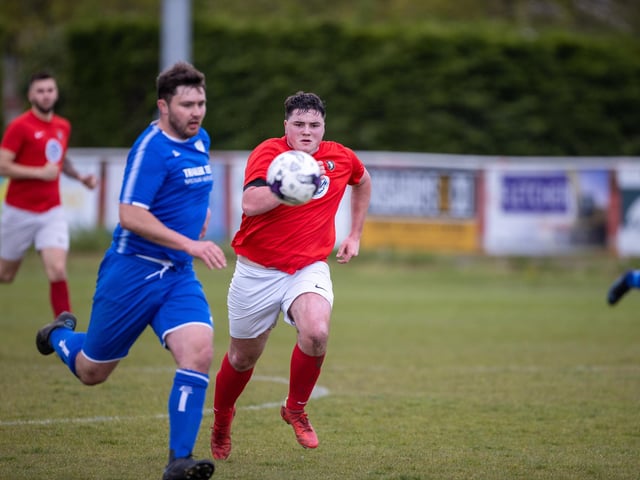 Action from Gosport Town's 4-0 victory over Lee Rangers (blue kit) in the Portsmouth & District FA Trophy final at Cams Alders. Picture: Alex Shute