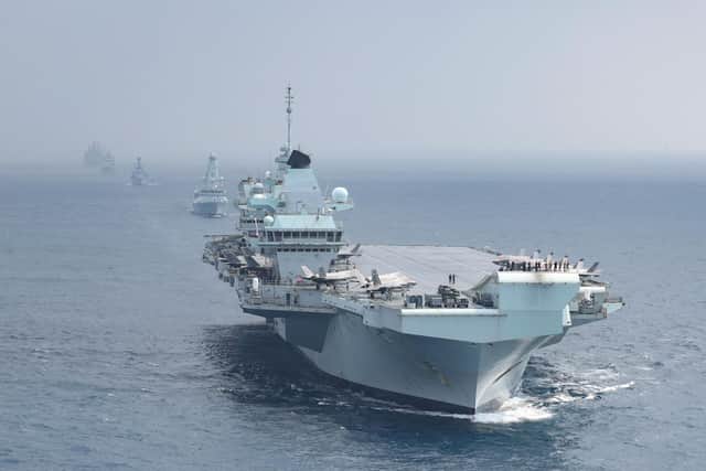 HMS Queen Elizabeth leading a task group during her mission to the Indo-Pacific and back again. Photo: Royal Navy
Pictured: From front to back are HMS Queen Elizabeth, HMS Defender, HMS Richmond, HNLMS Evertsen, RFA Tidespring and RFA Fort Victoria in formation ready to wave off American warship the USS The Sullivans.
USS THE SULLIVANS DEPARTS THE UK CARRIER STRIKE GROUP
On 19th October 2021, USS The Sullivans departs the United Kingdom Carrier Strike Group to head back to the United States of America.
HMS Queen Elizabeth, HMS Defender, HNLMS Evertsen, HMS Richmond, RFA Tidespring and RFA Fort Victoria lined up to wave off USS The Sullivans.
The Strike Group includes ships from the United States Navy, The Dutch Navy, and Marines from the US Marine Corps. As well as UK Frigates, Destroyers two RFA supply ships and air assets from 617 Sqn, 820 NAS, 815 NAS and 845 NAS. This will be the largest deployment of Fifth Generation Fighter Jets in history.
