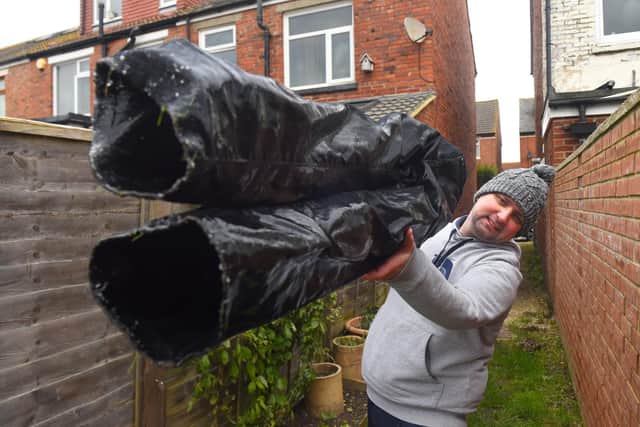Marcin said some slight weight gain over the last 12-months meant they trousers were difficult to put on even before they were frozen. Picture: Roger Arbon/Solent News & Photo Agency